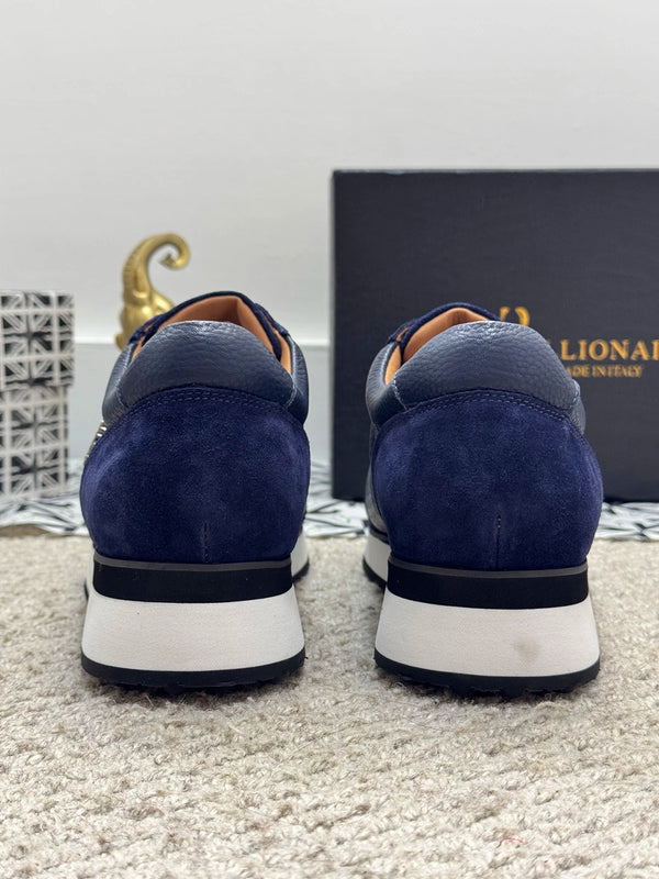 Men's black leather loafers with plush interior lining.