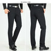 Classic men's dress pants in premium cotton, perfect for business and casual wear with a sleek straight leg design.