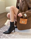 Chic black ankle boots with slim high heels, pointed toe design, perfect for autumn and winter fashion. Stylish women's footw