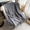 Lightweight paisley pashmina shawl perfect for year-round wear.