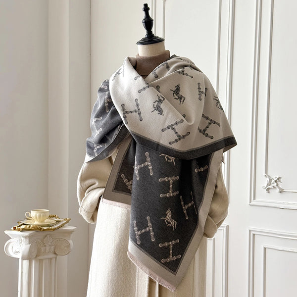 Floral cashmere poncho, combining warmth and style for cold evenings.