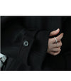 Refined woolen coat with single-breasted front and flattering belt