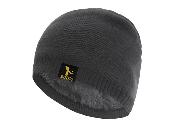 Forest green Winter Whisperer Beanie, crafted for durability and style, suitable for all winter activities.