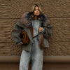 Woman wearing Cozy Rebellion plush jacket for bold style statement