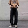 Men's black denim jeans with a loose fit and durable zipper fly closure.