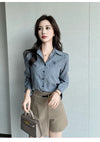 Chic striped blouse for office elegance, featuring a turn-down collar and single-breasted button front for professional style