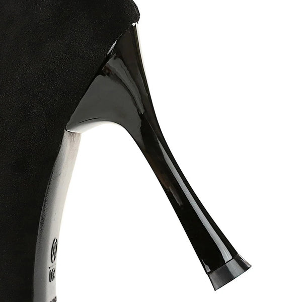 Elegant black dress pumps with durable rubber outsole.