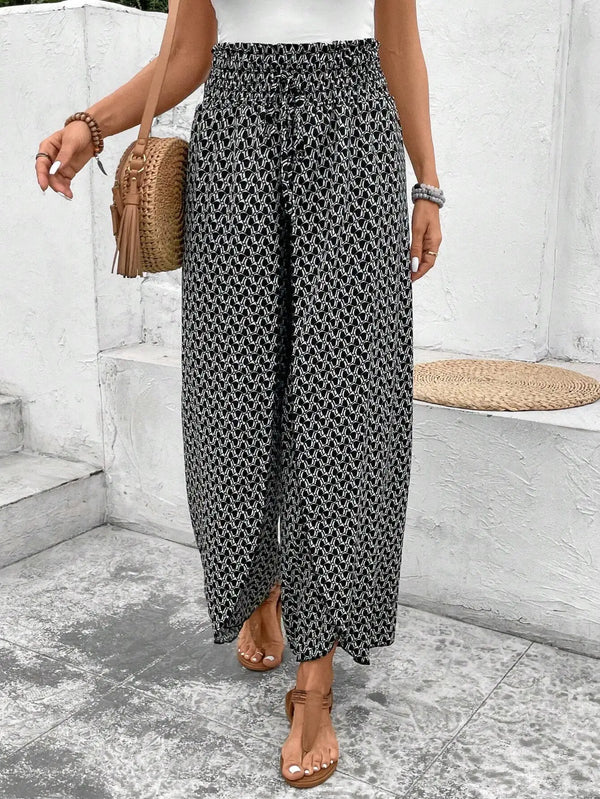 Floral wide-leg chiffon pants for women, ankle-length, elastic waist, perfect for summer fashion and casual chic outfits.
