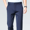 Close-up of high drape fabric texture on stretch business pants showing elegant flow and movement