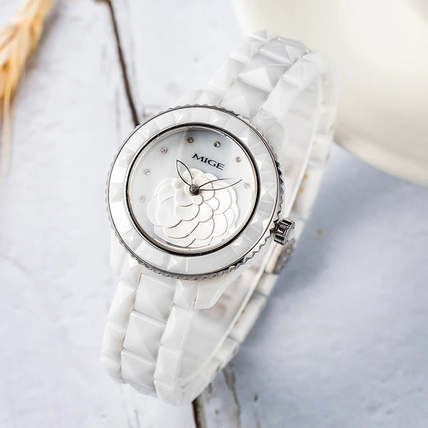 Rose gold ceramic watch with sapphire crystal dial and minimalist design.