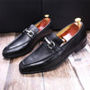 Three-quarter view of elegant black cow leather loafers