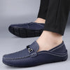 Elegant slip-on loafers in dark brown leather for a timeless look.