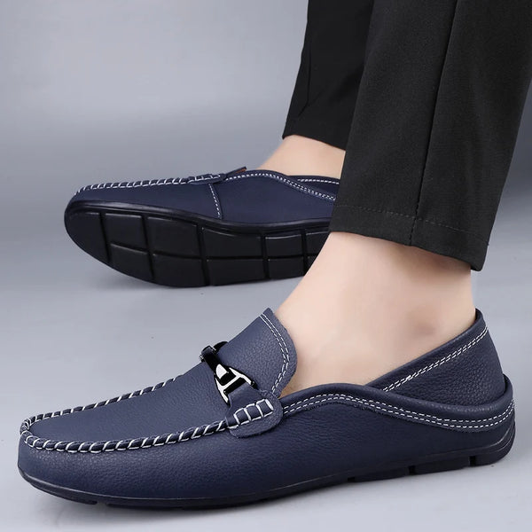 Elegant slip-on loafers in dark brown leather for a timeless look.