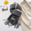 Versatile cashmere-feel scarf in rich chocolate, ideal for winter accessories.