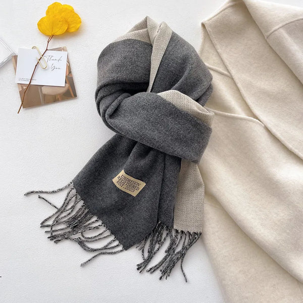 Versatile cashmere-feel scarf in rich chocolate, ideal for winter accessories.