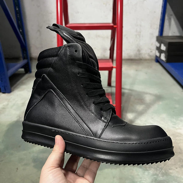 Unisex black leather high-top sneakers with zip closure