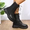 Chic white ankle boots with chunky heel, lace-up closure, and durable PU leather for stylish fall/winter outfits.
