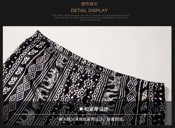 Bohemian flare leg pants for women in vibrant floral print, perfect for casual or festival wear, featuring an elastic waistba