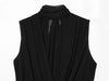 Women's sleeveless black top with vertical pleats and ribbon embellishment