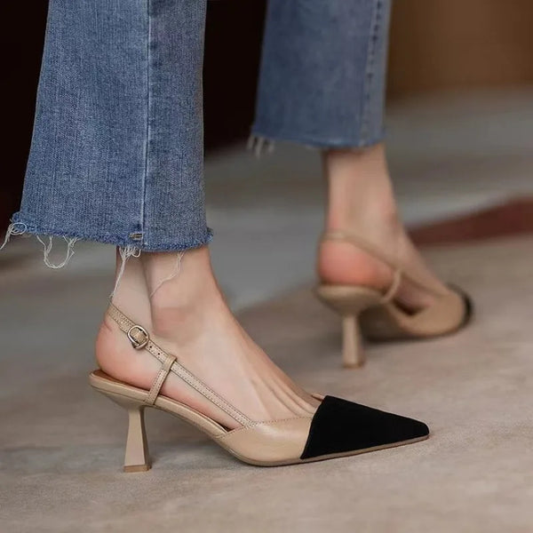 Elegant lace-up stiletto sandals featuring a sleek pointed toe design.
