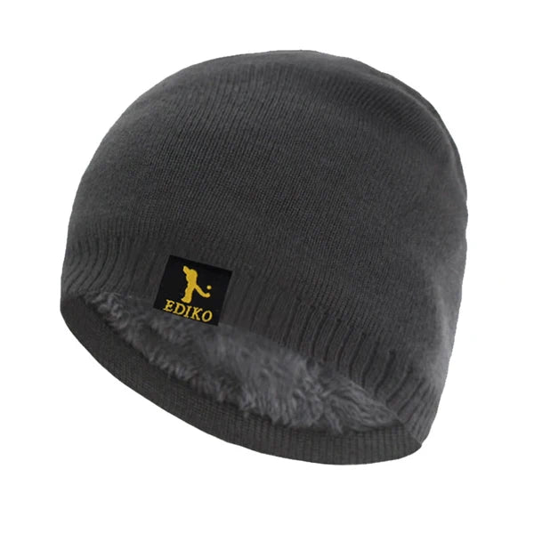 Vibrant pink Winter Whisperer Beanie, cozy and stylish for all your winter outings.