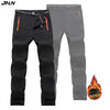 Fleece-lined waterproof hiking pants for cold weather outdoor adventures