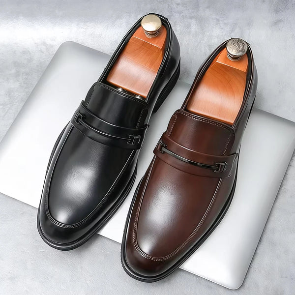 Black leather loafers for men, perfect for boardroom meetings.
