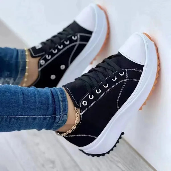 Canvas sneaker heel counter and ankle collar detail view