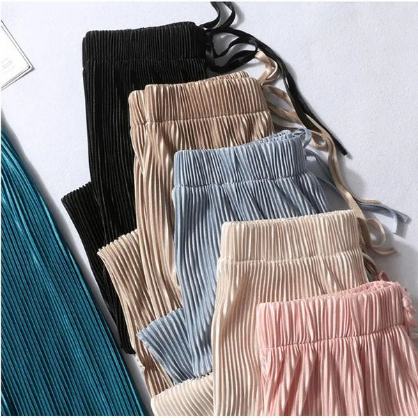 Chic wide leg summer pants for women in ice silk, pleated design, lightweight, breathable, and perfect for casual outings.