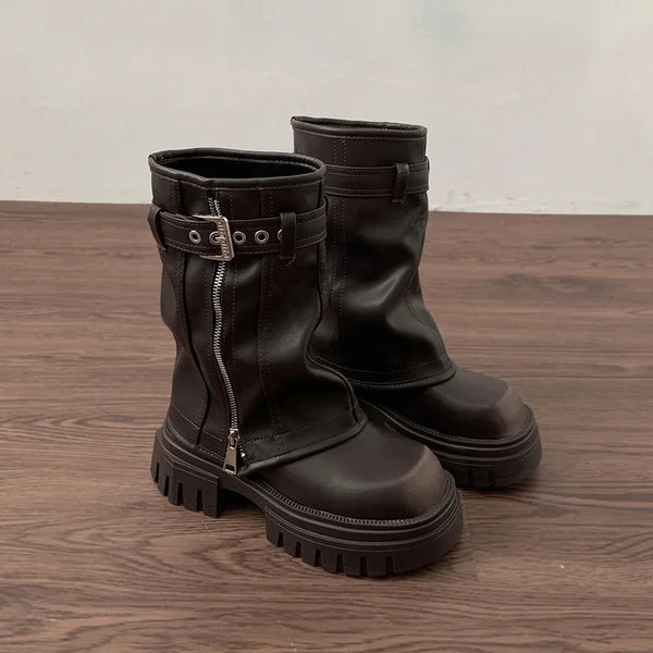 Chic women's mid-calf biker boots with buckle detail, zipper closure, and plush lining for stylish winter comfort.