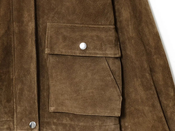 Chic women's leather jacket with button closure, lapel collar, and short length for stylish urban fashion and versatility.