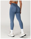 Deep purple high waist yoga leggings with ribbed texture.