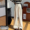 Full body shot of corduroy high waist wide leg pants showing elongating silhouette and graceful drape