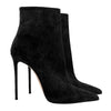 Elegant black mid-calf boots with plush interior lining.