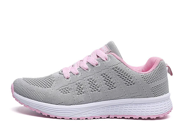 White mesh sports shoes featuring vibrant multi-color details