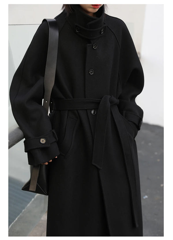 Classic long coat with turtleneck collar and adjustable waist cinch
