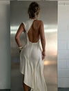 Romantic polyester maxi dress with halter neck, ruching, and eye-catching asymmetric silhouette
