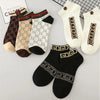 Men's ankle socks in a sophisticated geometric design, perfect for casual or business attire.