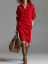 Model enjoying a cozy evening in the Fireside Chic dress, radiating warmth and elegance.