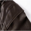 Chic belted leather bomber jacket for women, featuring lace-up detail, hood, and notched lapel, perfect for autumn and winter