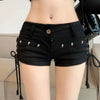 Black lace-up skinny denim shorts with side lacing detail and rivet accents on white background