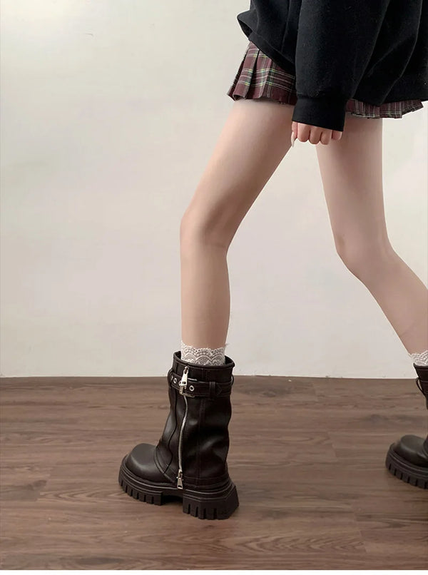 Chic women's mid-calf biker boots with buckle detail, cozy plush lining, and durable rubber sole for stylish winter wear.