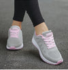 Lightweight white training shoes with multi-color details for all-day wear