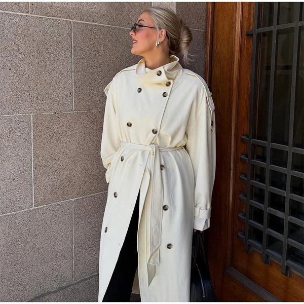 Timeless cream double-breasted trench coat ideal for transitional weather