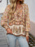 Bohemian Lace-Up V-Neck Blouse for women in vibrant print, featuring lantern sleeves and a loose fit, perfect for spring and