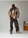 Woman wearing oversized plush jacket on chilly fall day