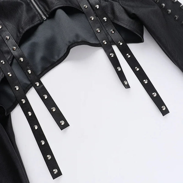 Chic cropped faux leather biker jacket for women with rivet detailing, slim fit, and zip closure for edgy style.