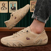 Brown leather-look stitched ankle boots with cushioned insole and reliable traction for modern men