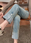 Chic high waist straight leg jeans for women in distressed wash, perfect for casual outings and office wear.