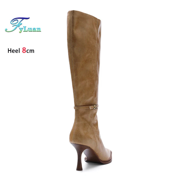 Durable rubber sole knee-high boots with an 8cm stiletto heel.